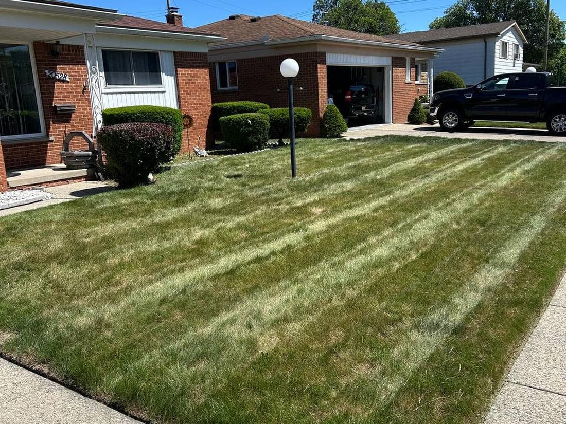 Completed lawn care and landscaping job in metro Detroit