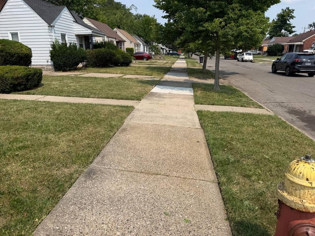 Completed lawn care and landscaping job in metro Detroit