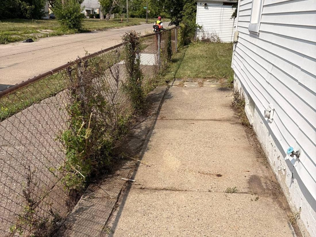 Completed lawn care and landscaping job in metro Detroit