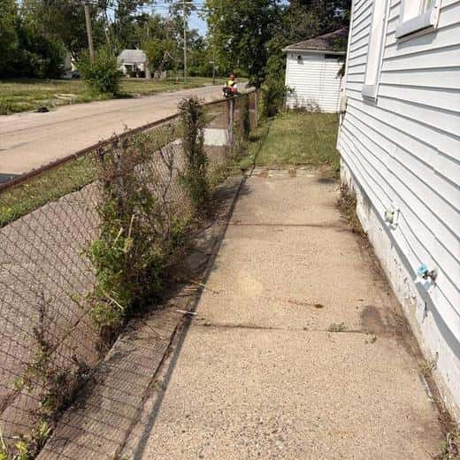 Woolfman Lawn Services on the job in metro Detroit